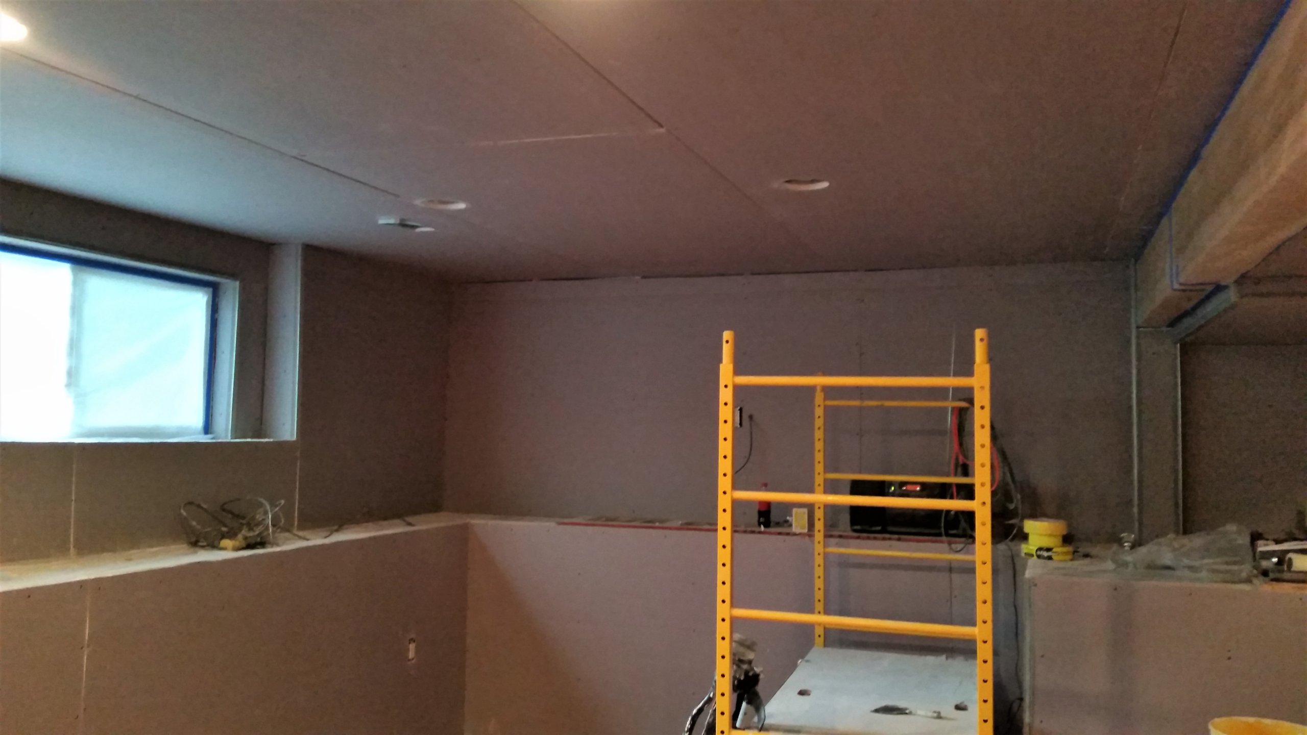 Basement renovation process: framing and insulation work