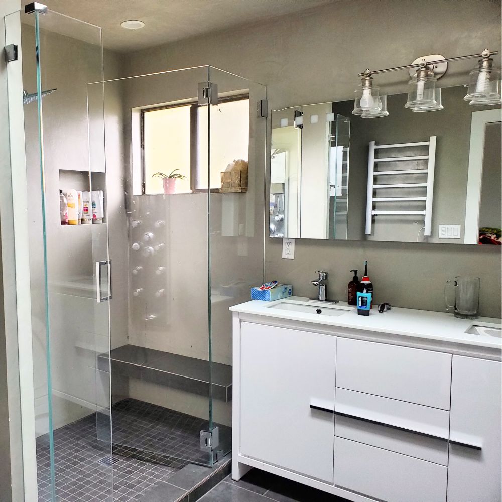 Modern bathroom design featuring waterproof plaster and ceiling window